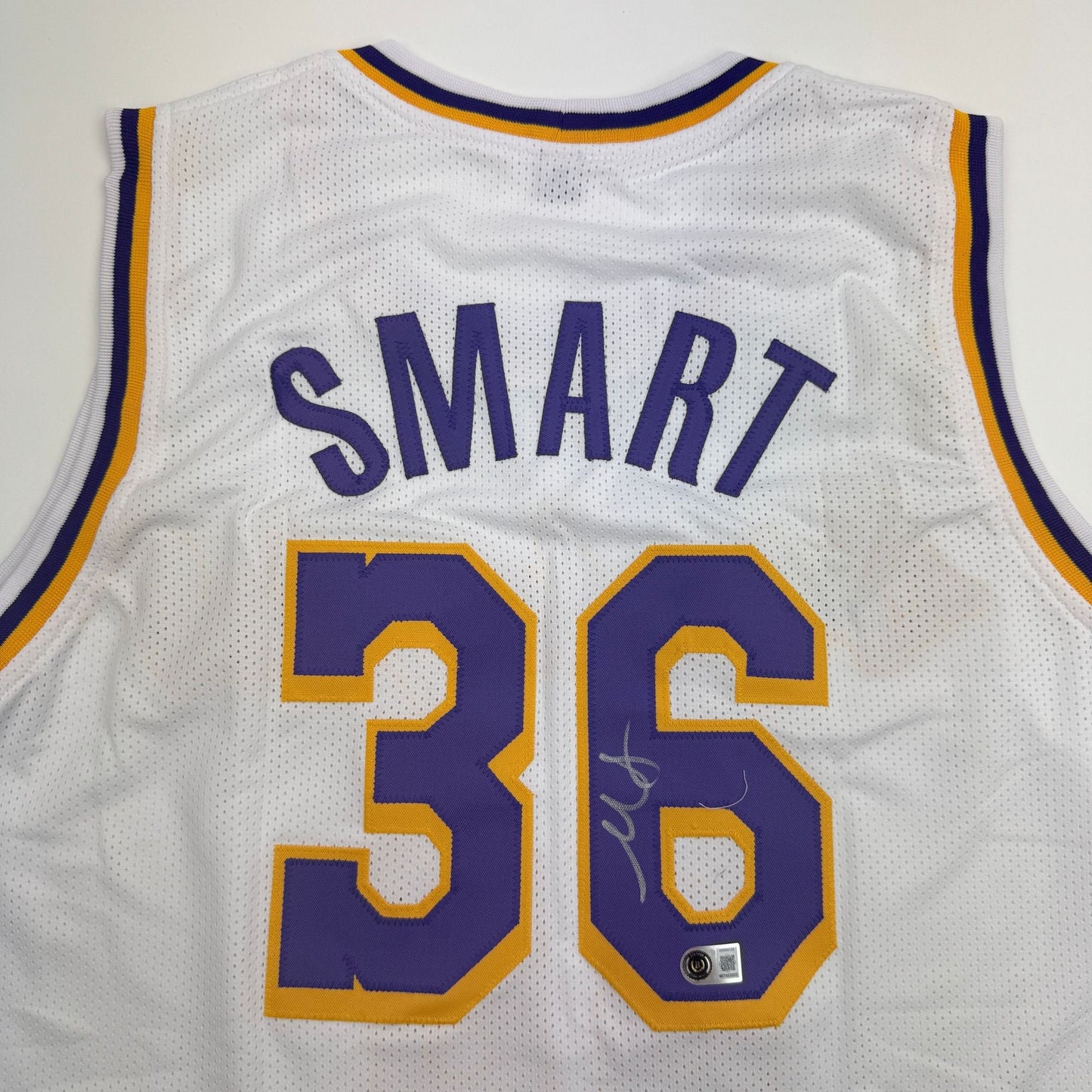 Autographed/Signed Marcus Smart Los Angeles White Basketball Jersey Beckett BAS COA