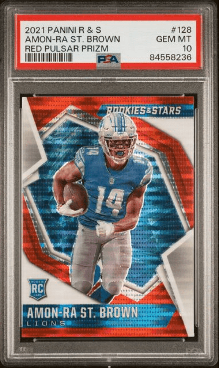 Graded 2021 Panini Rookies & Stars Amon-Ra St. Brown #128 Red Pulsar Prizm Rookie RC Football Card PSA 10 Gem Mint