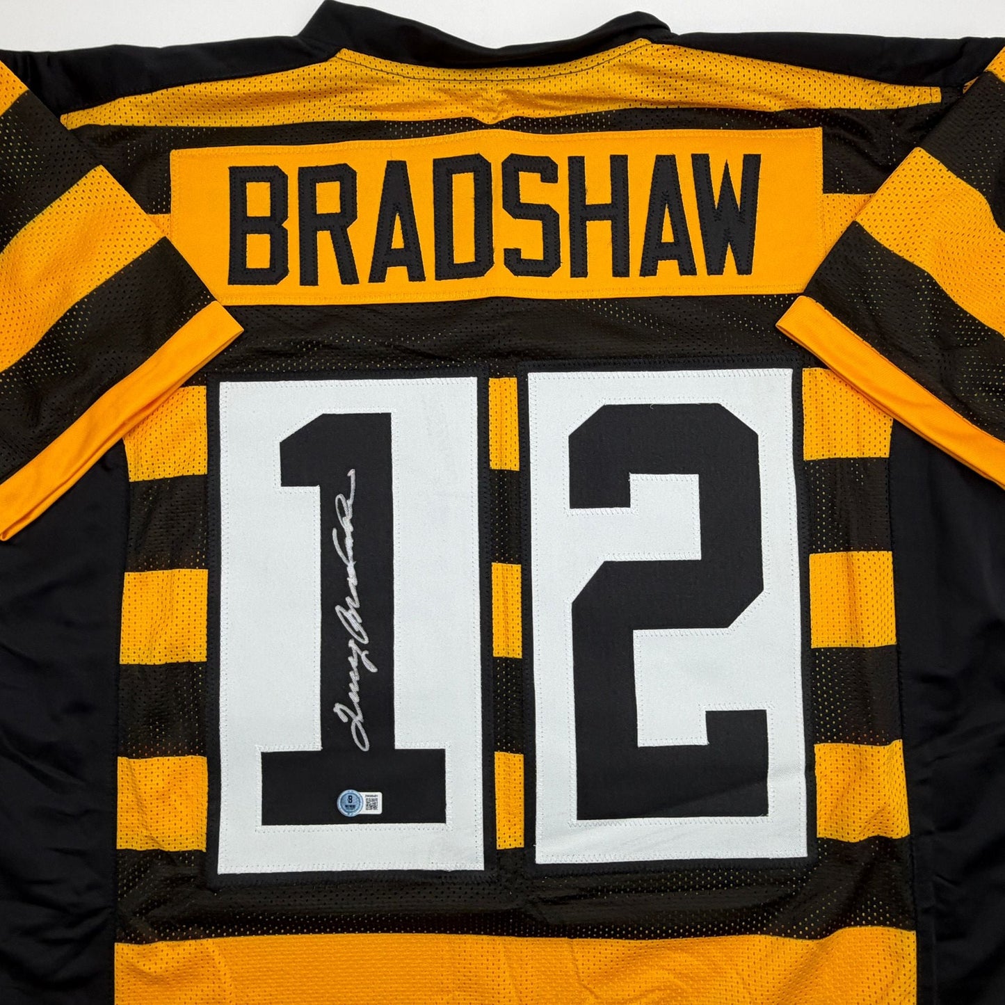 Autographed/Signed Terry Bradshaw Pittsburgh Bumble Bee Football Jersey Beckett BAS COA