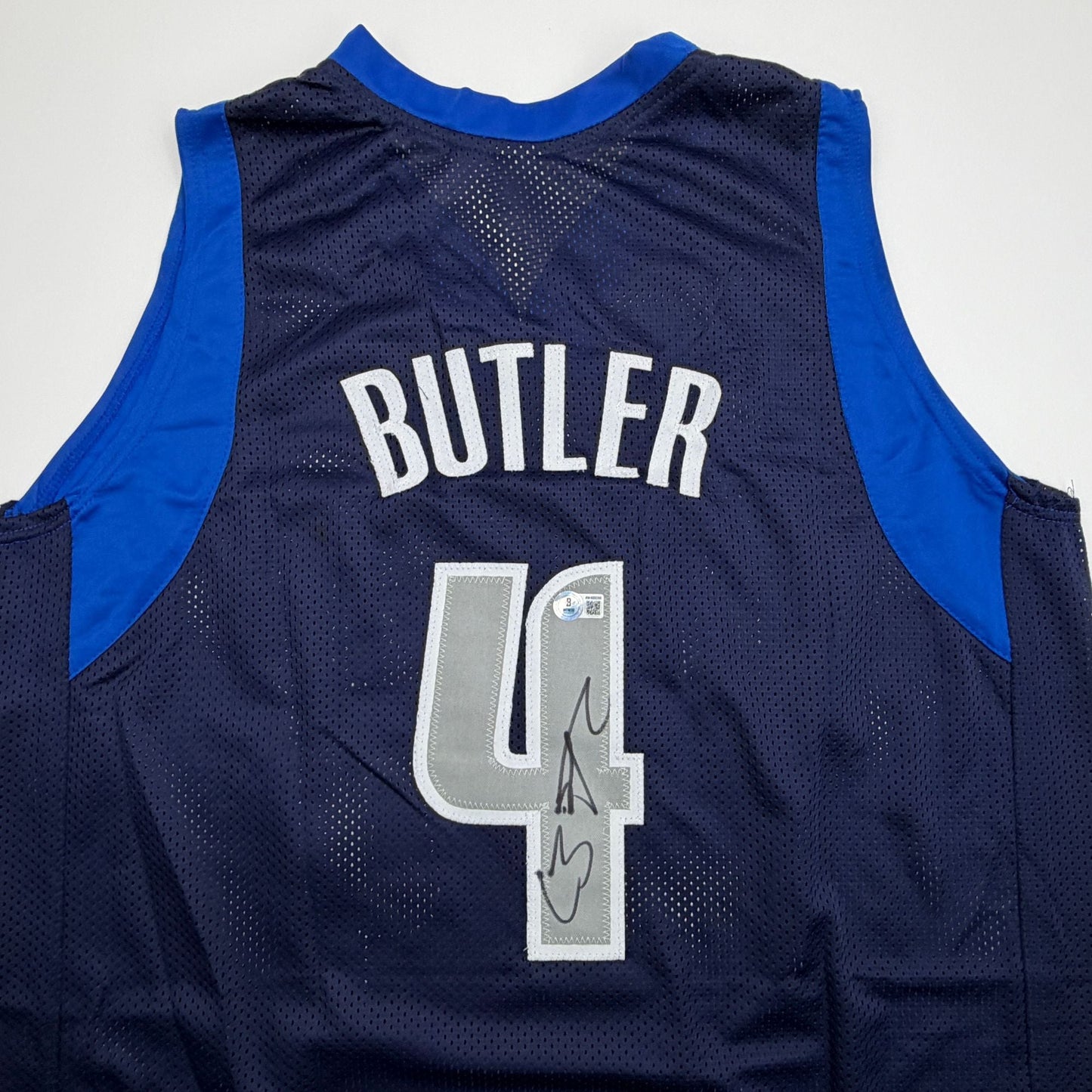 Autographed/Signed Caron Butler Dallas Blue Basketball Jersey Beckett BAS COA