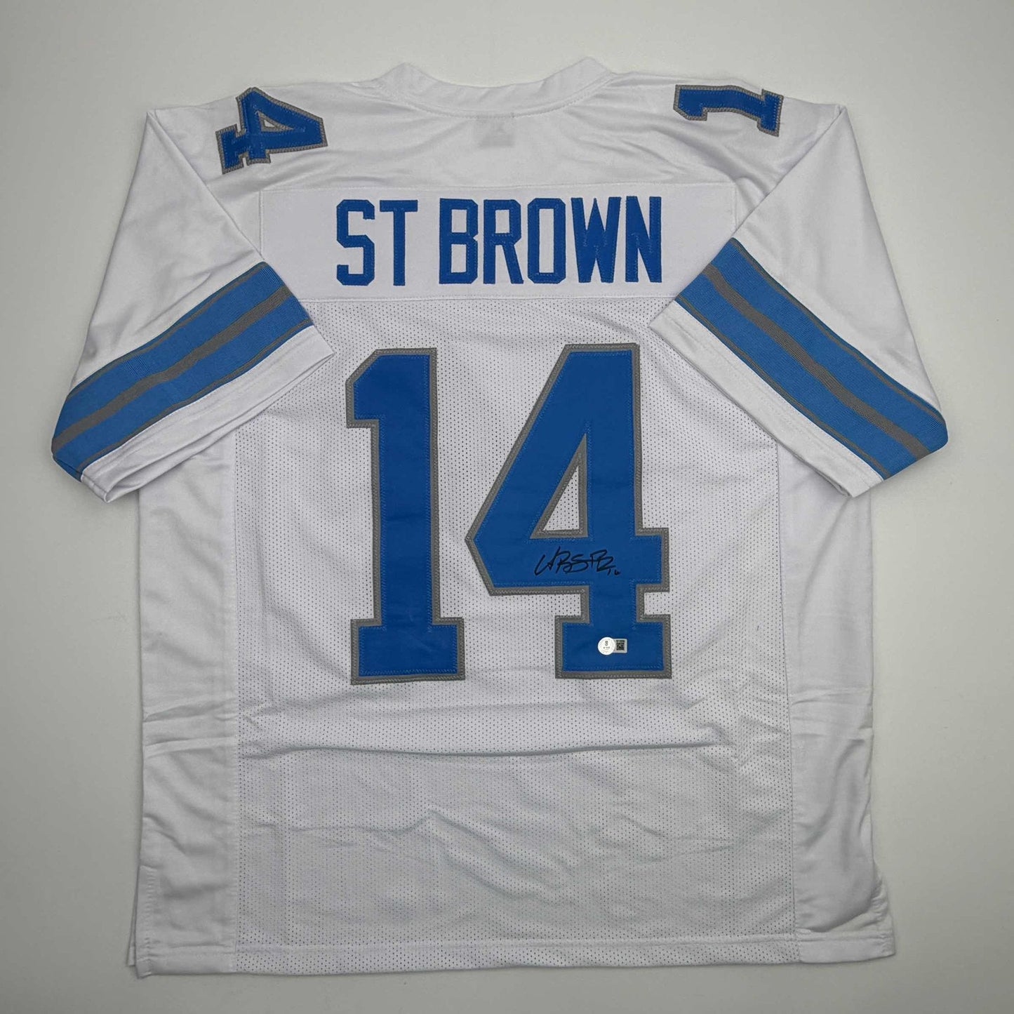 Autographed/Signed Amon-Ra St. Brown Detroit White Football Jersey Beckett BAS COA