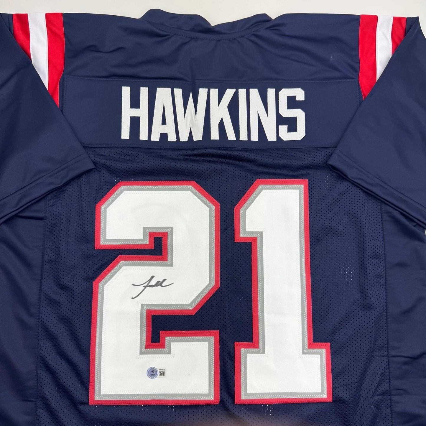 Autographed/Signed Jaylinn Hawkins New England Blue Football Jersey Beckett BAS COA