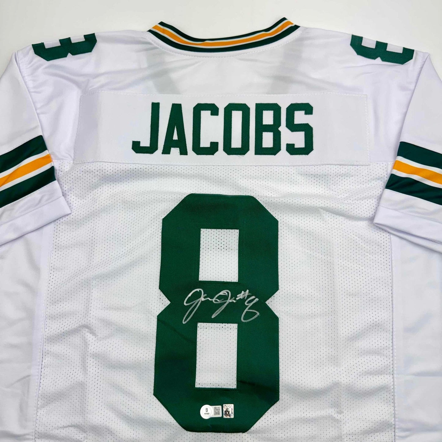 Autographed/Signed Josh Jacobs Green Bay White Football Jersey Beckett BAS COA