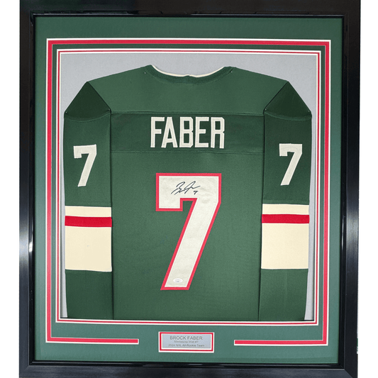 Framed Autographed/Signed Brock Faber 35x39 Minnesota Green Hockey Jersey JSA COA