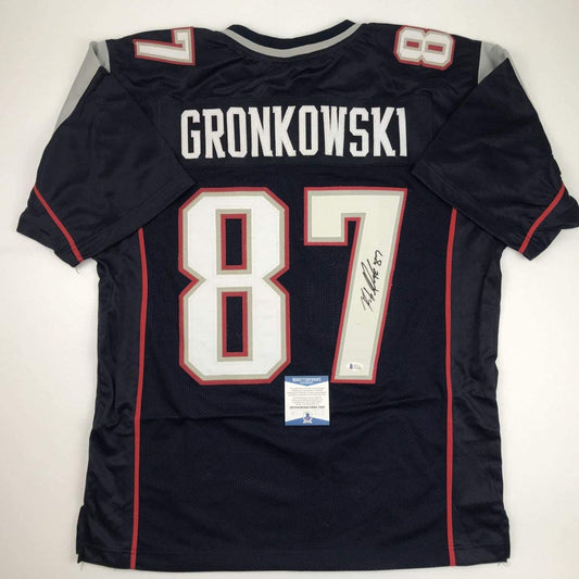 Autographed/Signed Rob Gronkowski New England Blue Football Jersey Beckett BAS COA