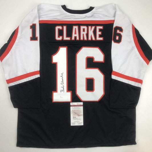 Autographed/Signed Bob Bobby Clarke Philadelphia Black Hockey Jersey JSA COA