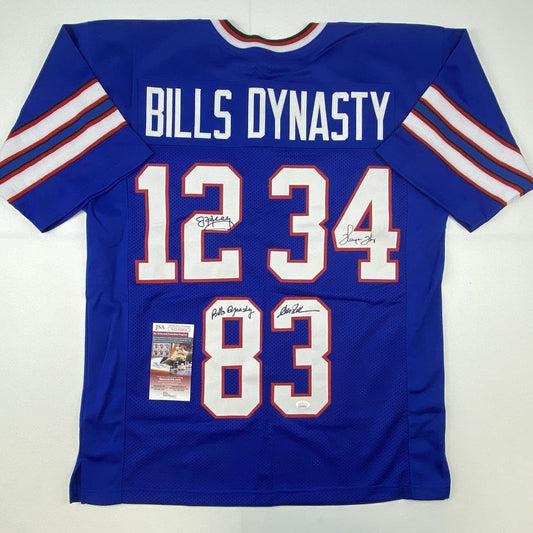Autographed/Signed Jim Kelly Thurman Thomas Andre Reed Buffalo Dynasty Blue Football Jersey JSA COA