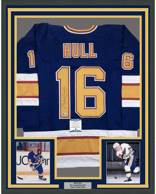 Framed Autographed/Signed Brett Hull 35x39 St. Louis Blue Hockey Jersey Beckett BAS COA - Golden Apple Comics