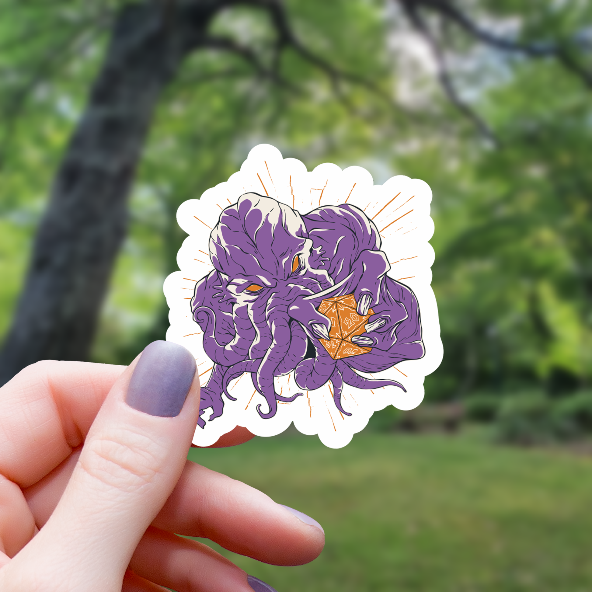 Cthulhu Holding a Polyhedral Dice Sticker - 3" - Golden Apple Comics