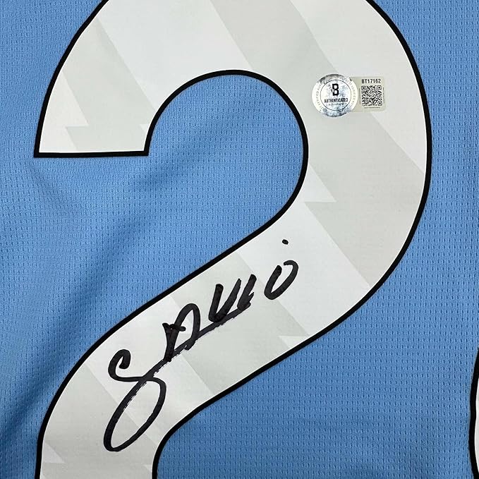 Framed Autographed/Signed Savinho 35x39 Manchester City Blue Soccer Futbol Jersey Beckett BAS COA