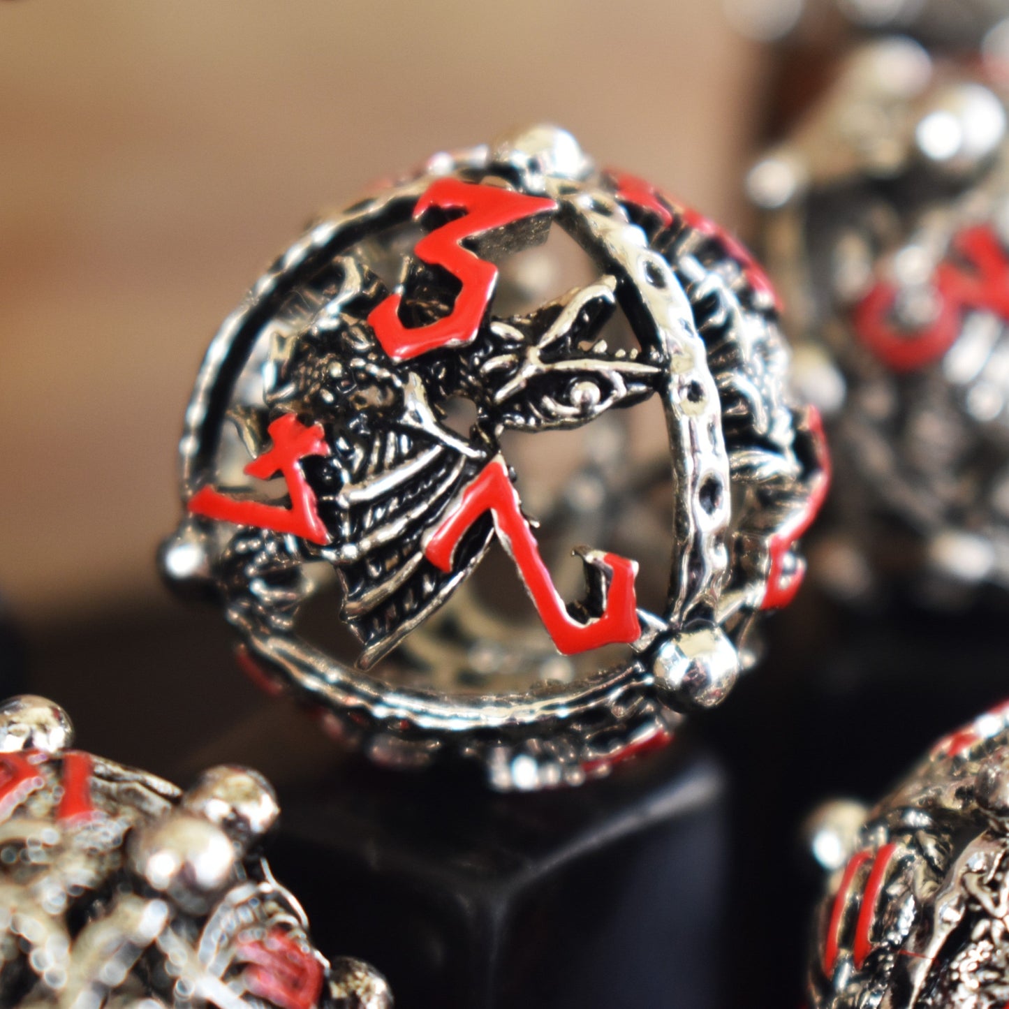 Orb of the Dragon Hollow Metal Dice Set - Silver and Red