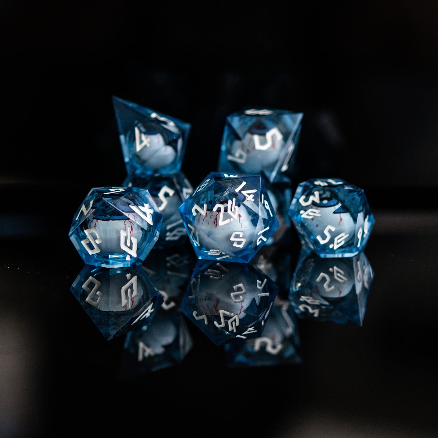 The Watcher: Blue-Eyed Liquid Core Dice Set