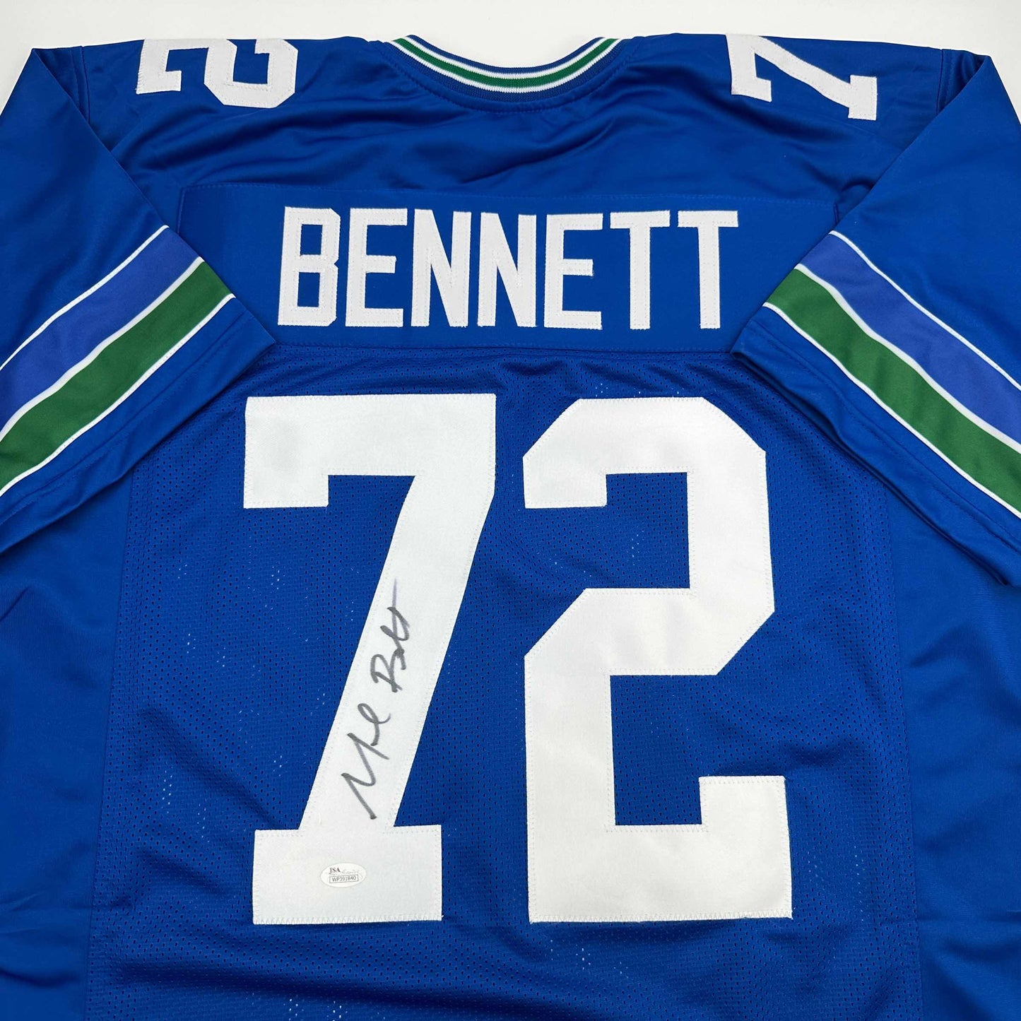 Autographed/Signed Michael Bennett Seattle Blue Retro Football Jersey JSA COA