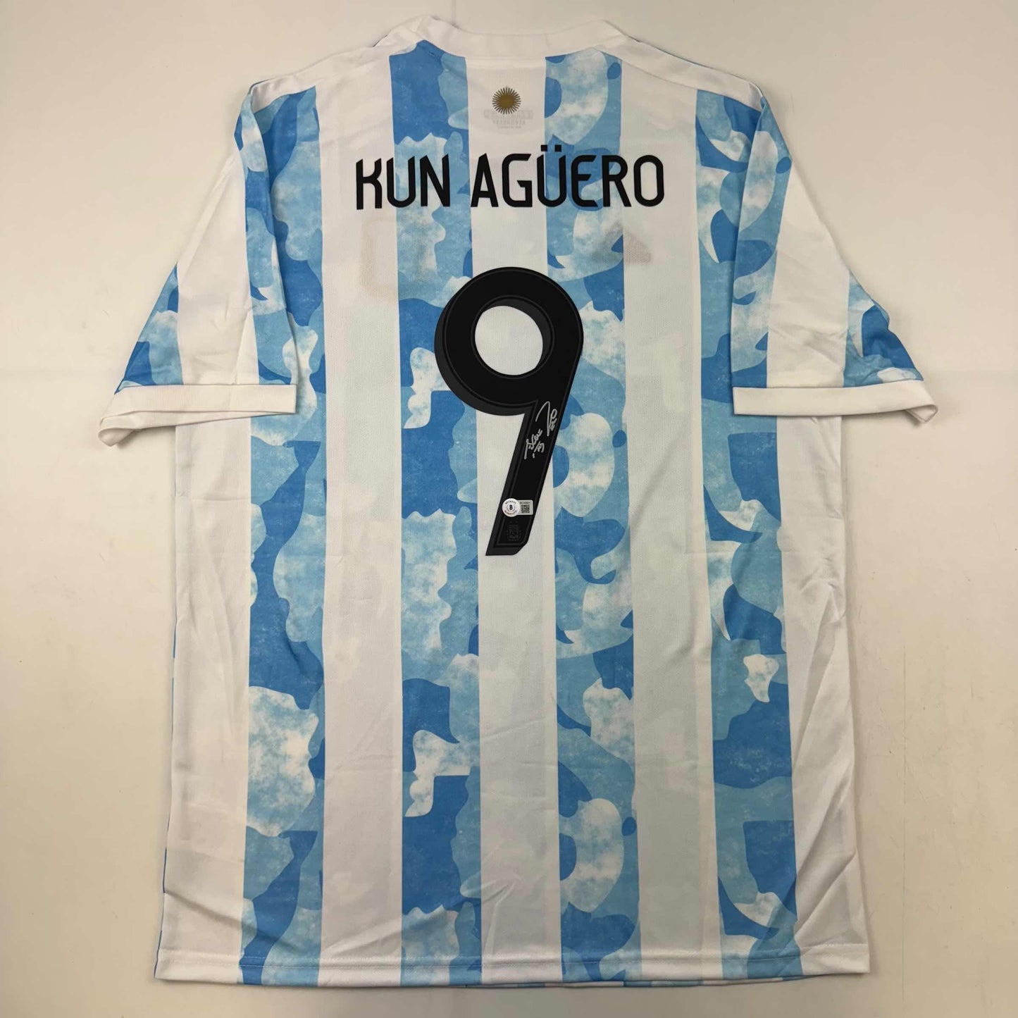 Autographed/Signed Sergio Kun Aguero 2021 Argentina Home Blue Soccer Futbol Jersey Beckett BAS COA