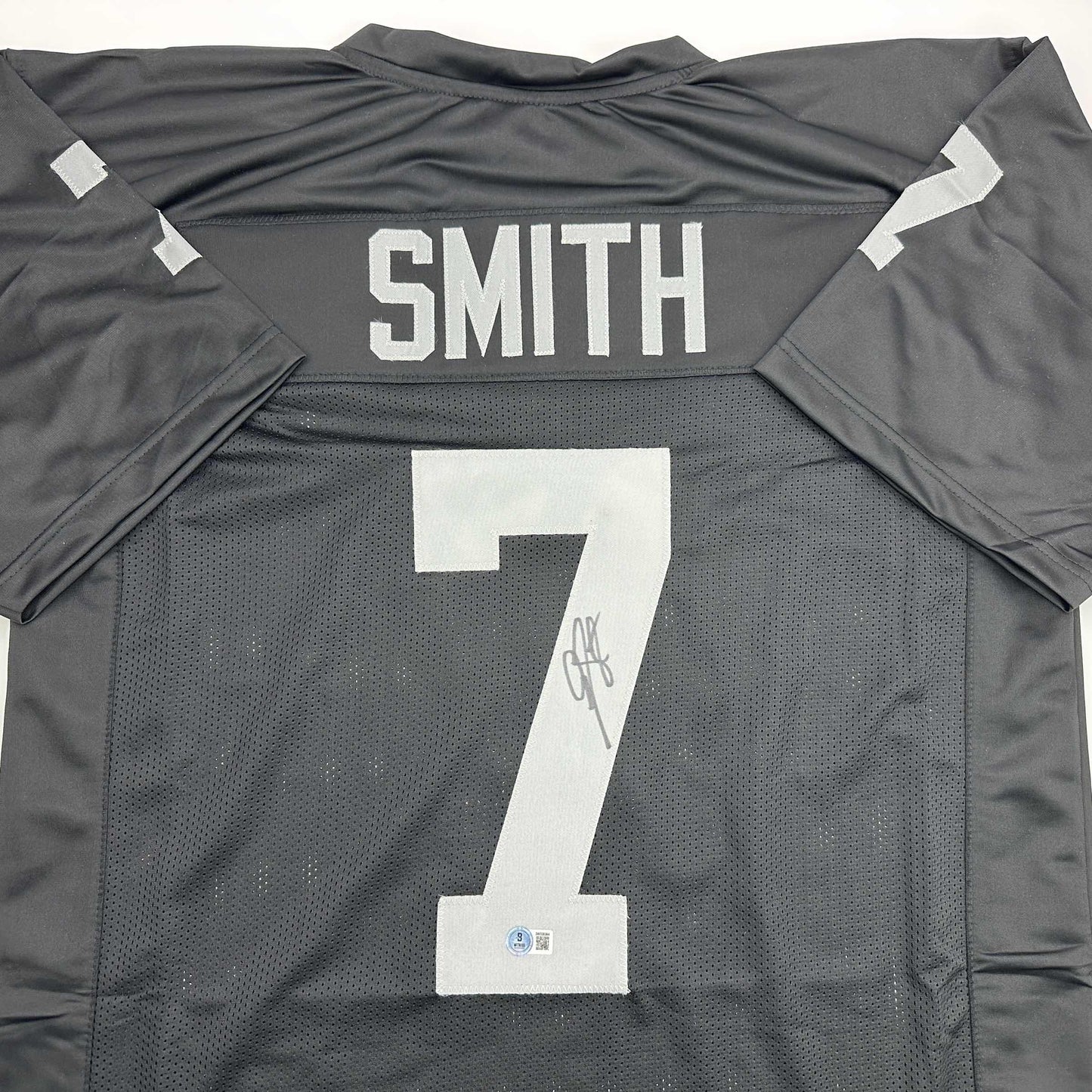 Autographed/Signed Geno Smith Oakland Black Football Jersey Beckett BAS COA