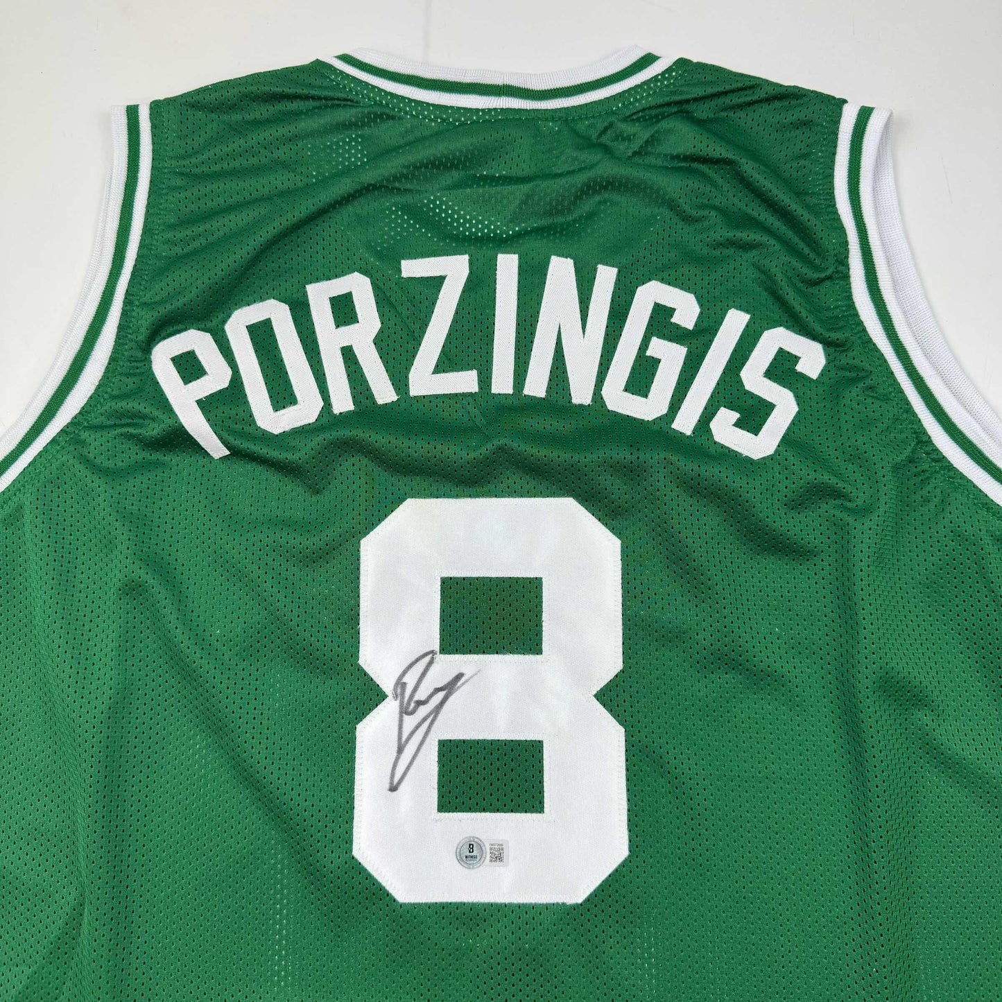 Autographed/Signed Kristaps Porzingis Boston Green Basketball Jersey JSA COA