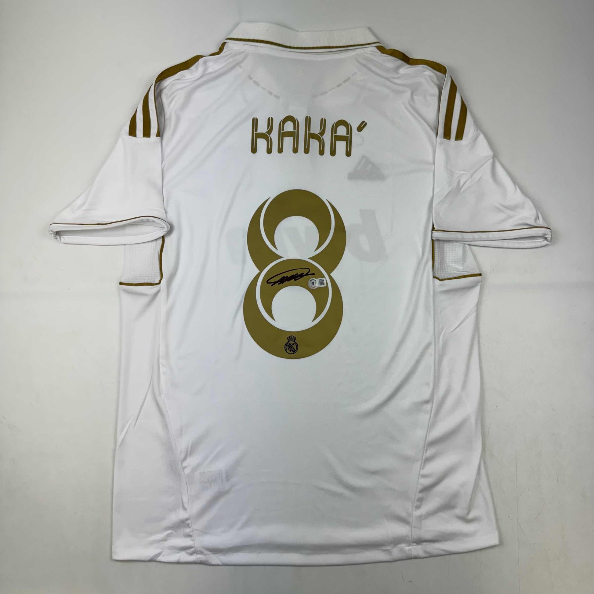 Autographed/Signed Ricardo Kaka Real Madrid White/Gold Retro Soccer Futbol Jersey Beckett BAS COA - Golden Apple Comics