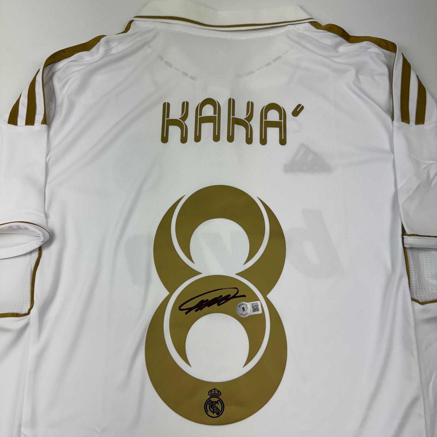 Autographed/Signed Ricardo Kaka Real Madrid White/Gold Retro Soccer Futbol Jersey Beckett BAS COA - Golden Apple Comics