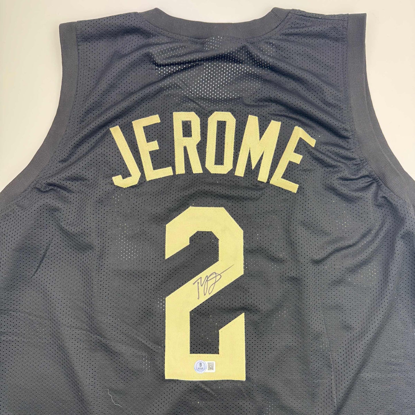 Autographed/Signed Ty Jerome Cleveland Black Basketball Jersey Beckett BAS COA