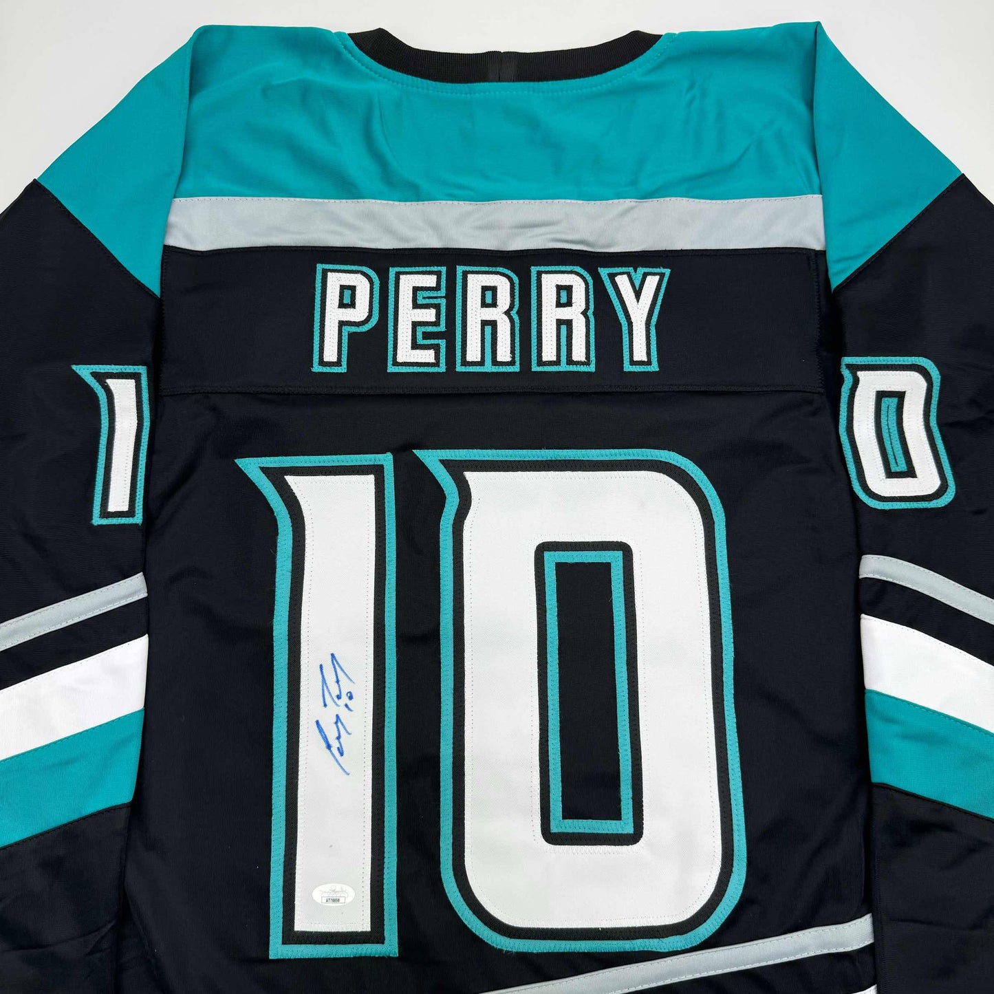Autographed/Signed Corey Perry Anaheim Black Retro Hockey Jersey JSA COA