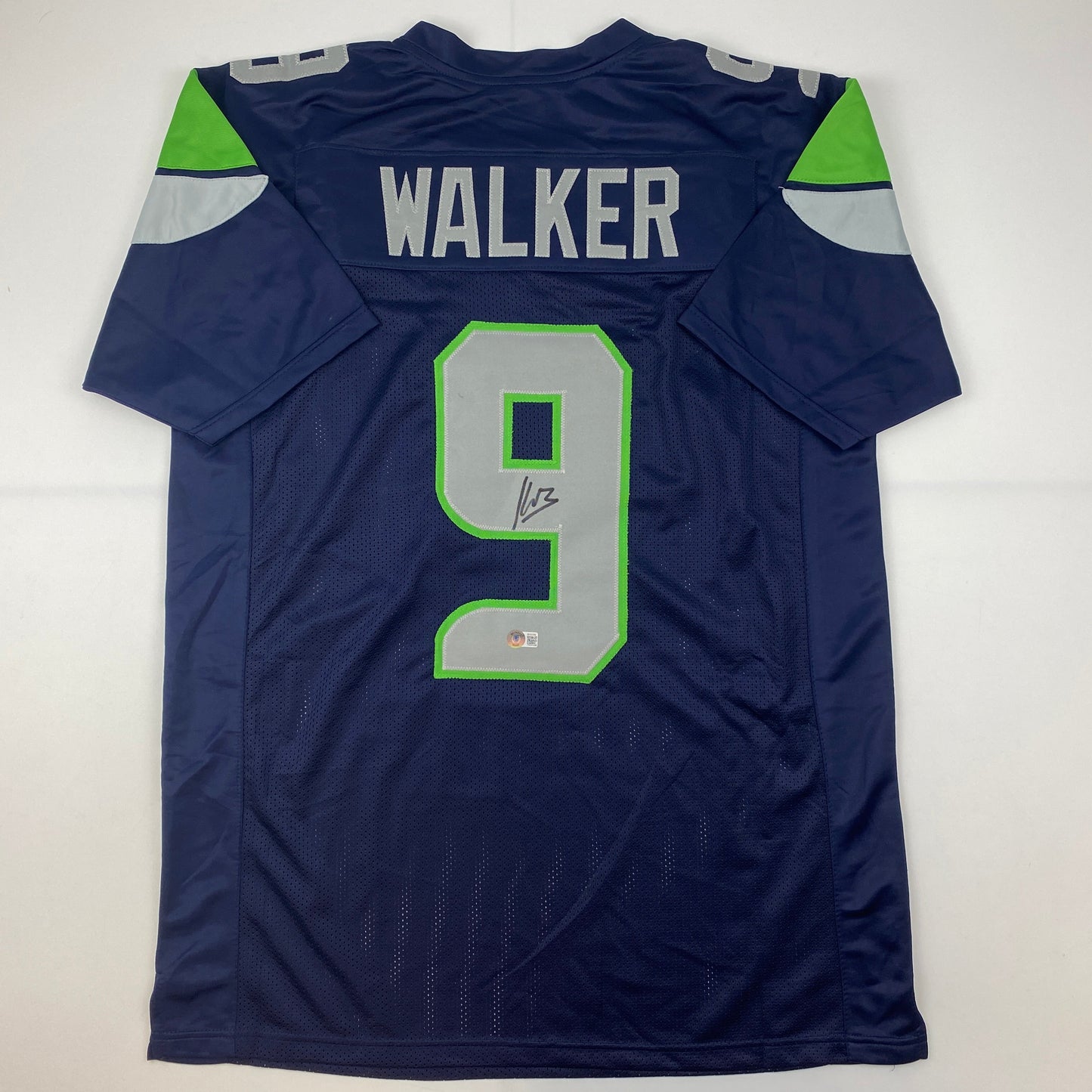 Autographed/Signed Kenneth Walker Seattle Blue Football Jersey Beckett BAS COA