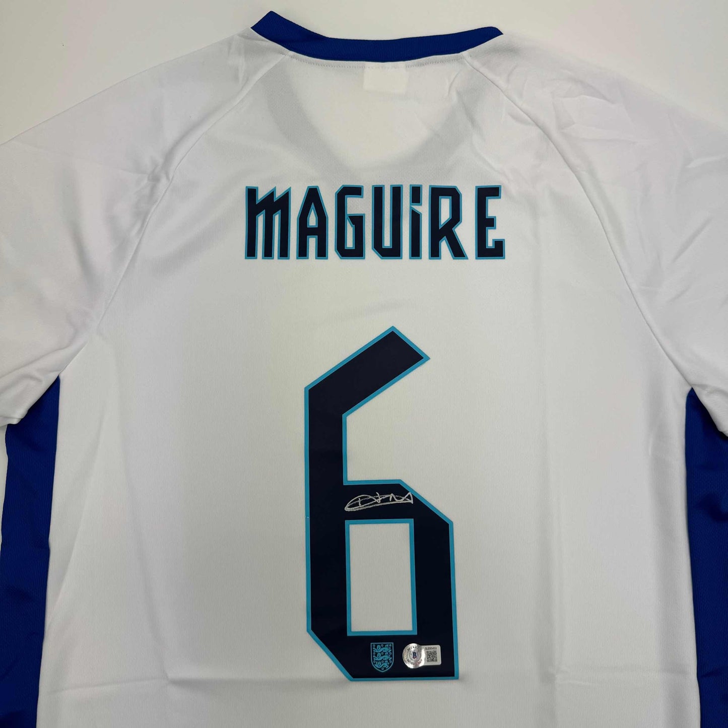 Autographed/Signed Harry Maguire England White Soccer Jersey Beckett BAS COA