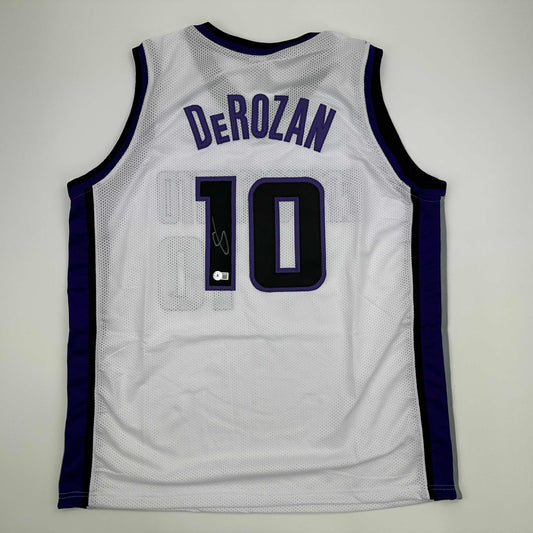 Autographed/Signed DeMar DeRozan Sacramento White Basketball Jersey Beckett BAS COA