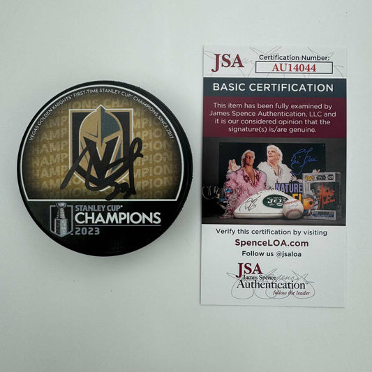 Autographed/Signed Alec Martinez Las Vegas Golden Knights 2023 Stanley Cup Logo Hockey Puck JSA COA