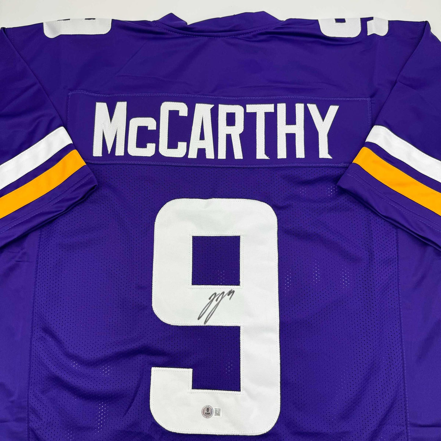 Autographed/Signed J.J. JJ McCarthy Minnesota Purple Football Jersey Beckett BAS COA