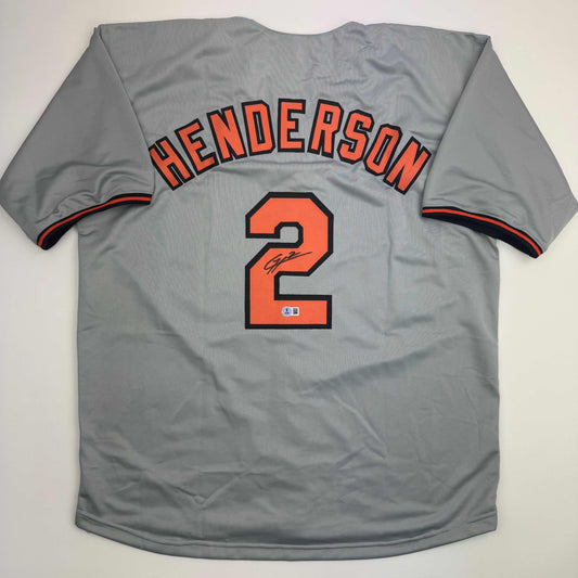Autographed/Signed Gunnar Henderson Baltimore Grey Baseball Jersey Beckett BAS COA