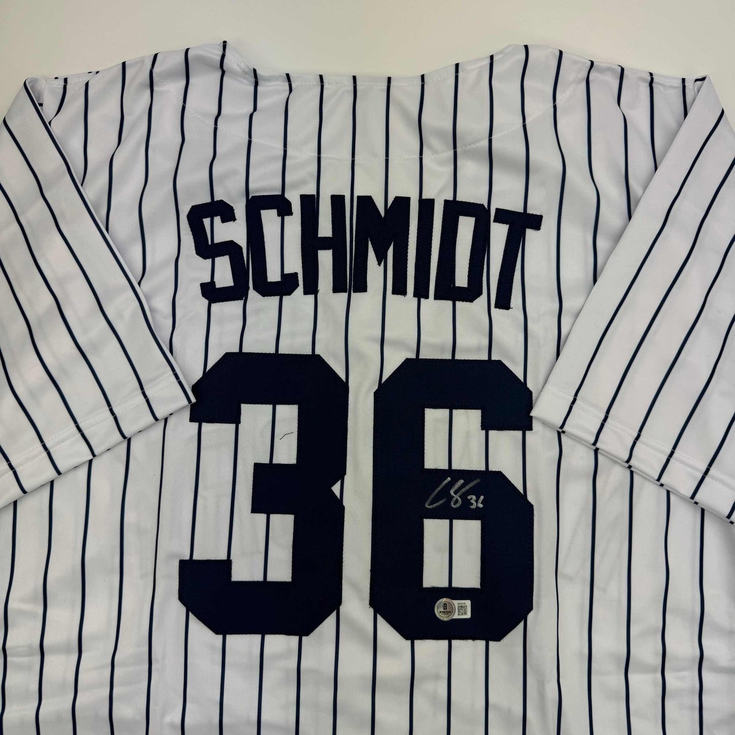 Autographed/Signed Clarke Schmidt New York Pinstripe Baseball Jersey Beckett BAS COA