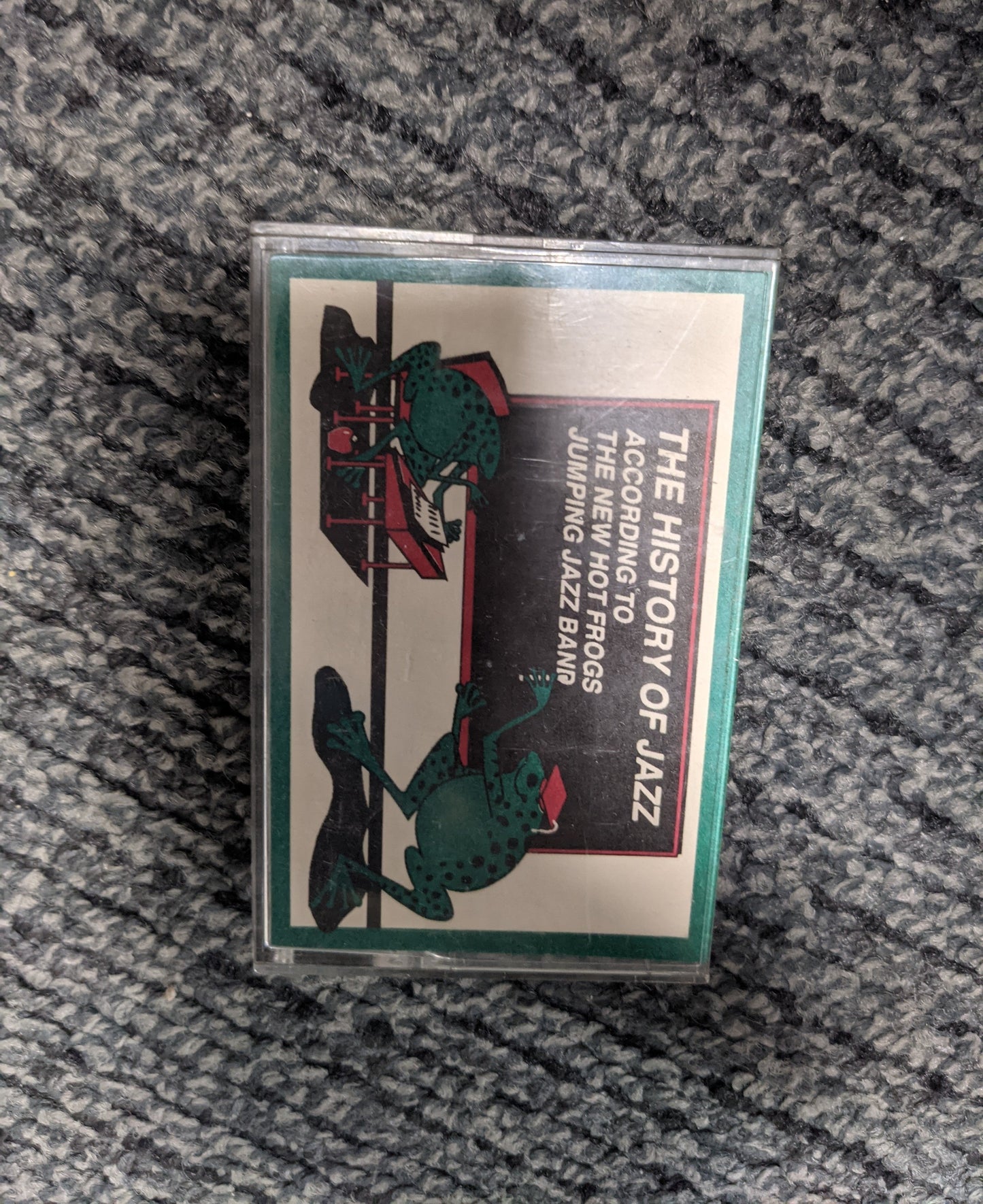 New Hot Frogs Jumping Jazz Band, The – The History Of Jazz According To The New Hot Frogs Jumping Jazz Band Volume XI Cassette *Used 1993 Release*