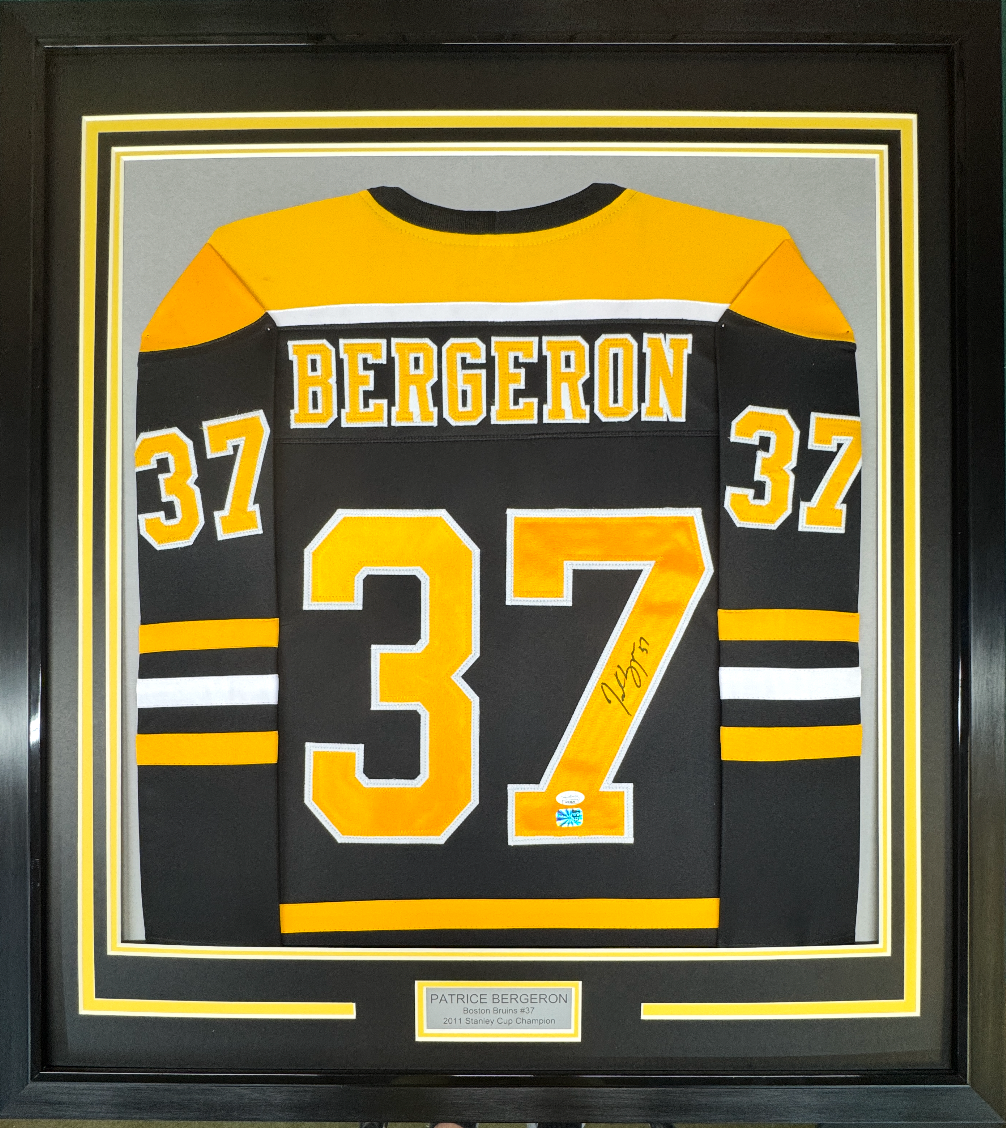 Framed Autographed/Signed Patrice Bergeron 35x39 Boston Black Hockey Jersey JSA COA