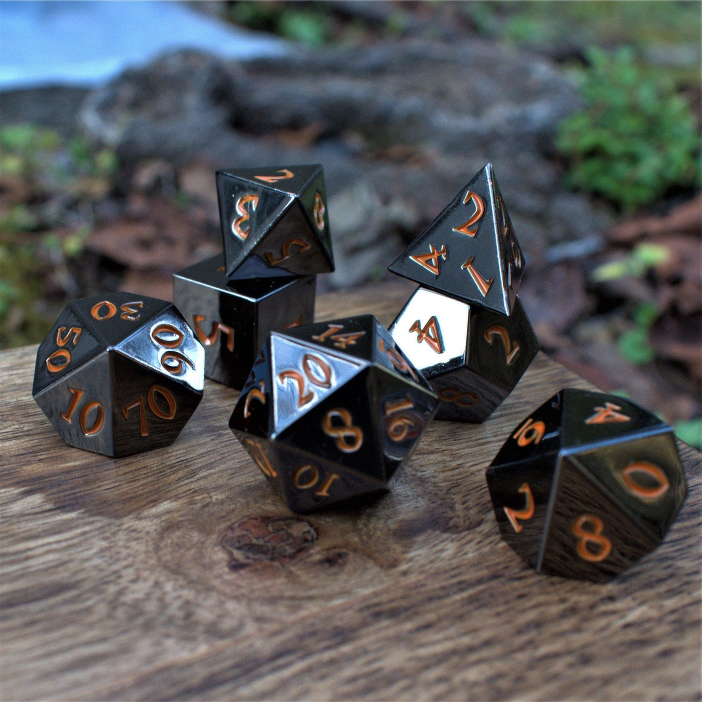 Black and Orange Sharp-Edged Metal Dice